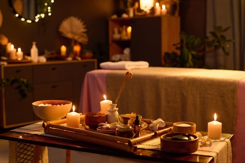 Boho Garden Spa massage room with candles